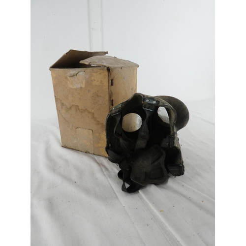 302 - A boxed vintage gas mask.