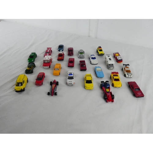 308 - A collection of vintage toy cars.