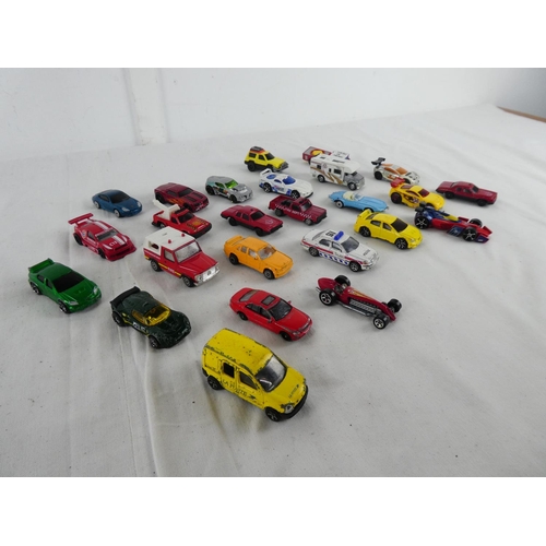 308 - A collection of vintage toy cars.