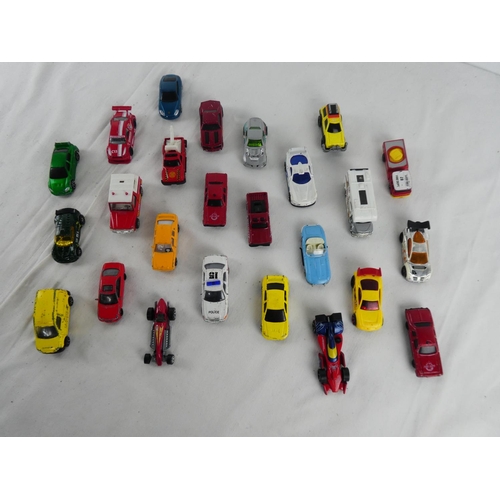 308 - A collection of vintage toy cars.