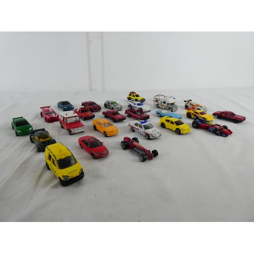 308 - A collection of vintage toy cars.