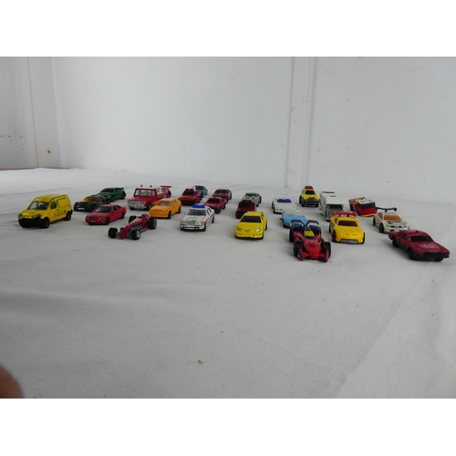 308 - A collection of vintage toy cars.