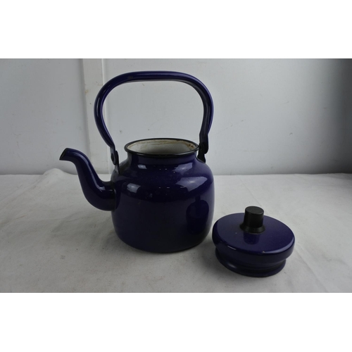 67 - A vintage blue enamel teapot.