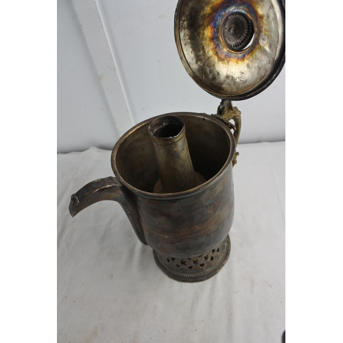 72 - An unusual large antique metal teapot with brass handle.