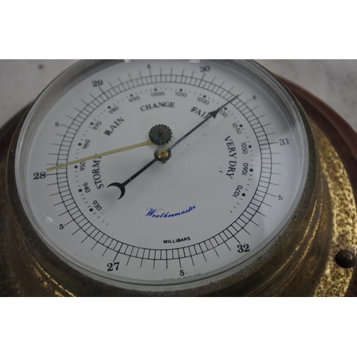 93 - A Weathermaster barometer.