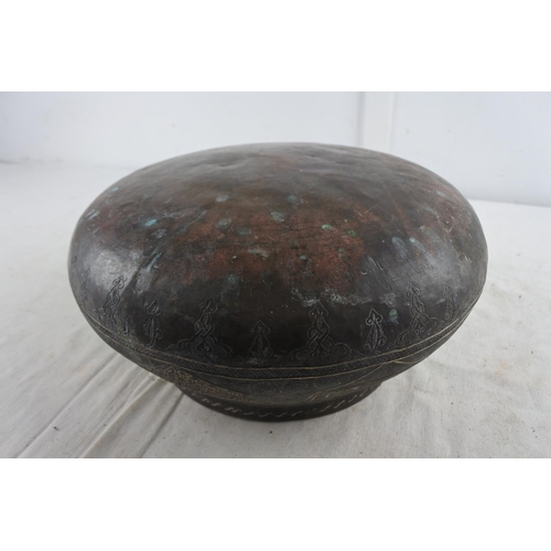 98 - A stunning antique copper Islamic pot with decorative design.