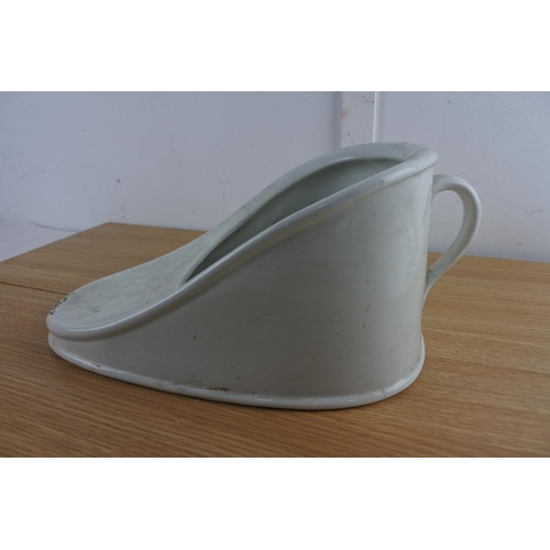 202 - A vintage ceramic slipper bed pan.