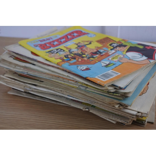 204 - A lot of assorted comics to include Beano, Beezer & more.