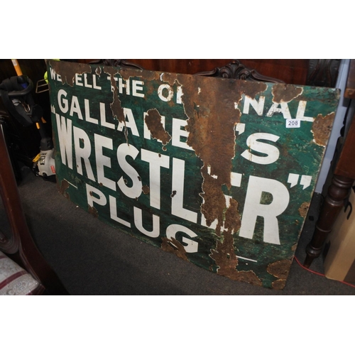 208 - A stunning large  original enamel sign 'We Sell the Original Gallaher's Wrestler Plug', measuring 54... 