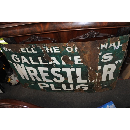 208 - A stunning large  original enamel sign 'We Sell the Original Gallaher's Wrestler Plug', measuring 54... 