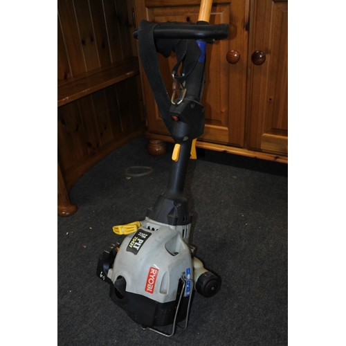 228 - A Ryobi petrol strimmer.