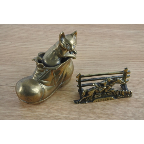 235 - A brass ornament of a cat and boot and a brass letterholder.