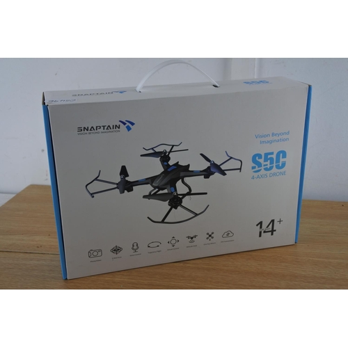 245 - A Snaptain S5C drone and box (a/f).