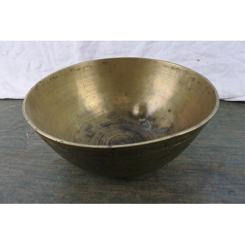 260 - A stunning large heavy bronze Oriental bowl with seal to base.