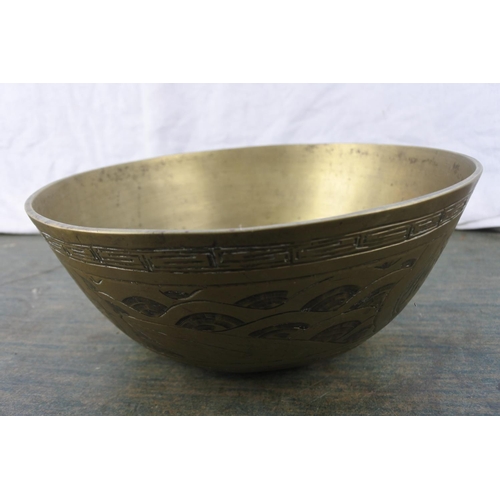 260 - A stunning large heavy bronze Oriental bowl with seal to base.