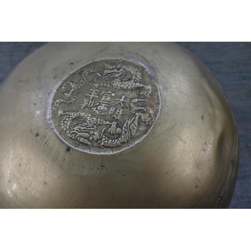 260 - A stunning large heavy bronze Oriental bowl with seal to base.