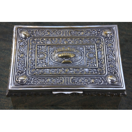 284 - A decorative metal trinket box.