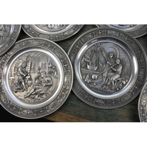 287 - Seven German pewter collectors plates.