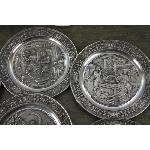 287 - Seven German pewter collectors plates.