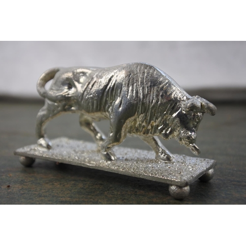 288 - A small Irish pewter figure of a bull.