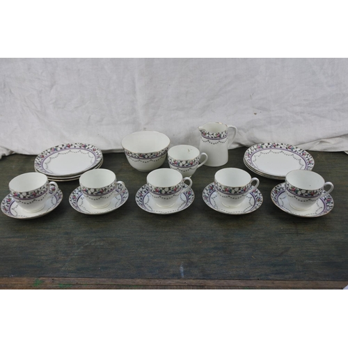 295 - A decorative tea set.