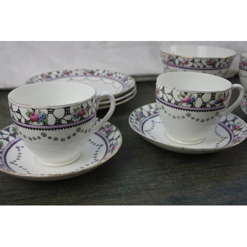 295 - A decorative tea set.