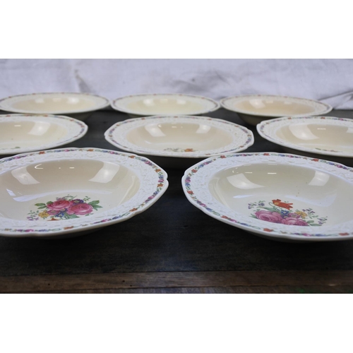 297 - A set of 8 Crown Ducal 'Gainsborough' desert plates.