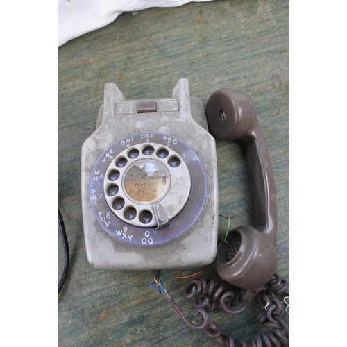 280 - Three vintage telephones.