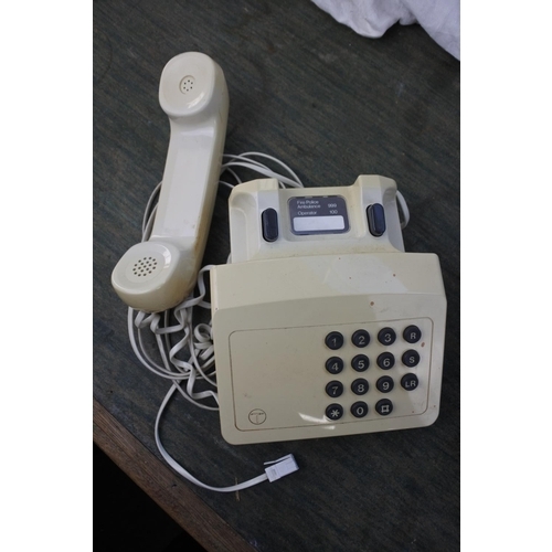 280 - Three vintage telephones.