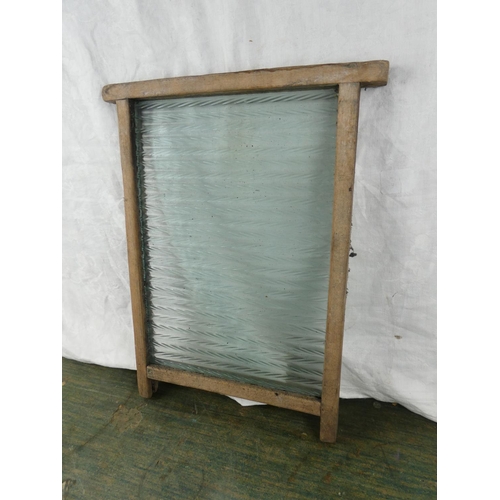 101 - A vintage glass washboard.