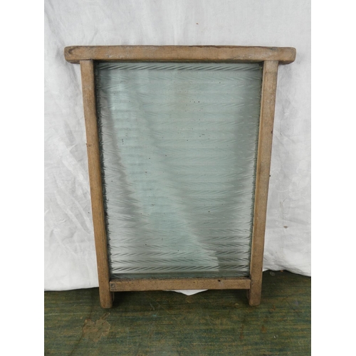 101 - A vintage glass washboard.