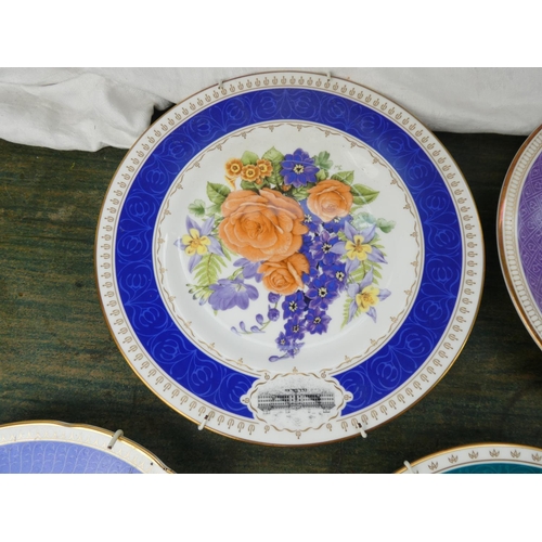 104 - A set of 8 Royal Horticultural Society flower patterned plates made by Royal Grafton.