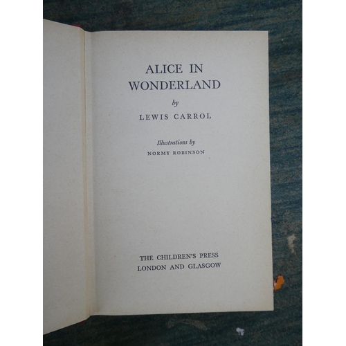 105 - A collection of antique and vintage books to include Alice in Wonderland by Lewis Carroll and more.