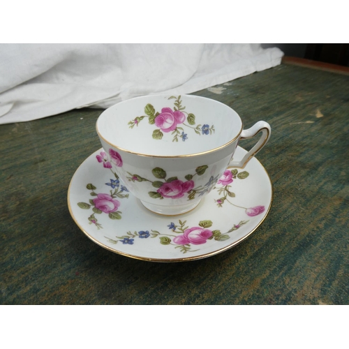 108 - A floral patterned Paragon tea set.