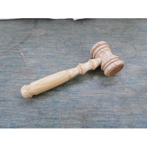 110 - An auctioneer's wooden gavel.