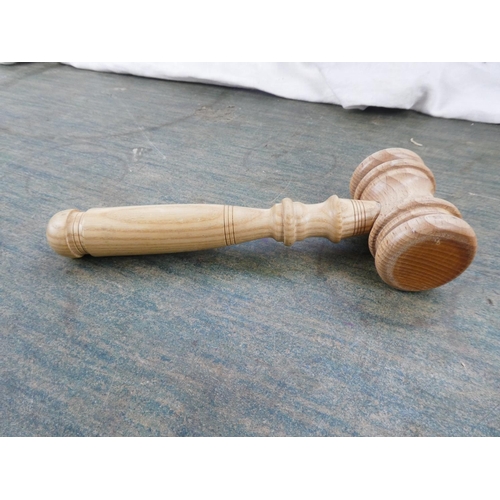 110 - An auctioneer's wooden gavel.