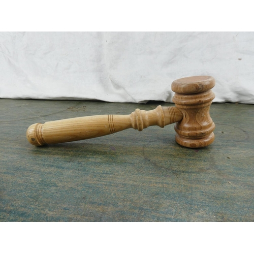 110 - An auctioneer's wooden gavel.