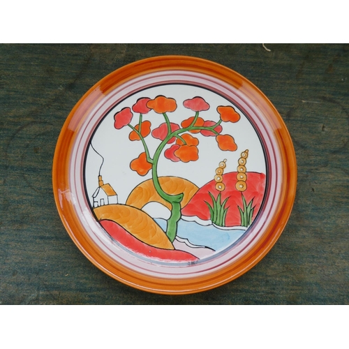 115 - A Clarice Cliff 'Bridgewater' Newport pottery hand painted plate.