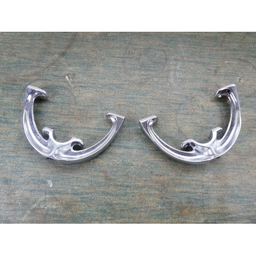 136 - A pair of metal riding stirrups.