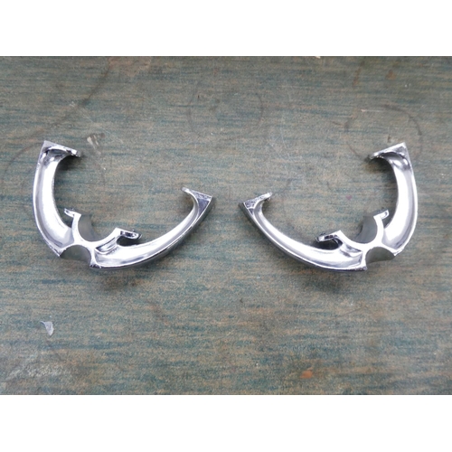 136 - A pair of metal riding stirrups.