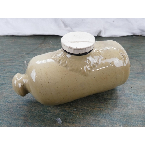 142 - A small antique stoneware hot water bottle.