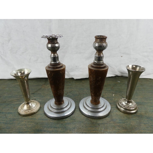 143 - A pair of vintage wood and metal candlesticks.