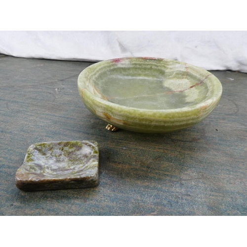 144 - A large marble bowl and brass feet and more.