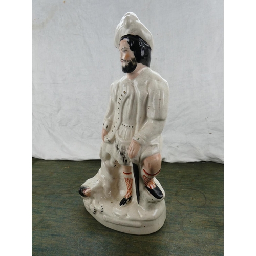 160 - A large antique Staffordshire figure.