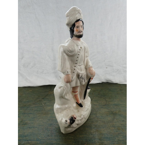 160 - A large antique Staffordshire figure.