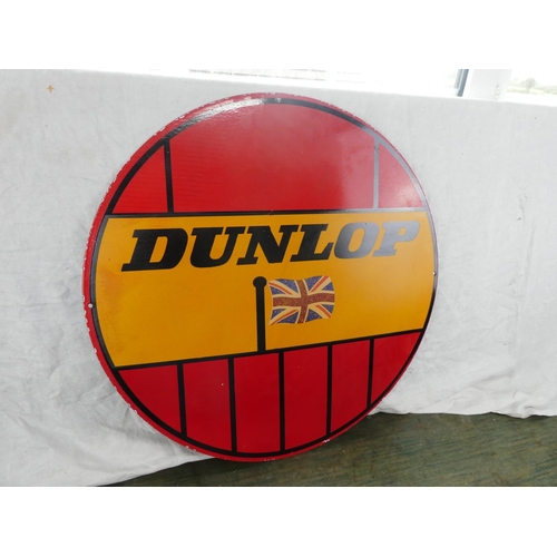 163 - A reproduction enamel 'Dunlop' sign, measuring 60cm.