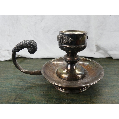 164 - A large silver plated scroll handle candleholder stamped Alpaca.