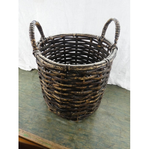 165 - A wicker log basket.