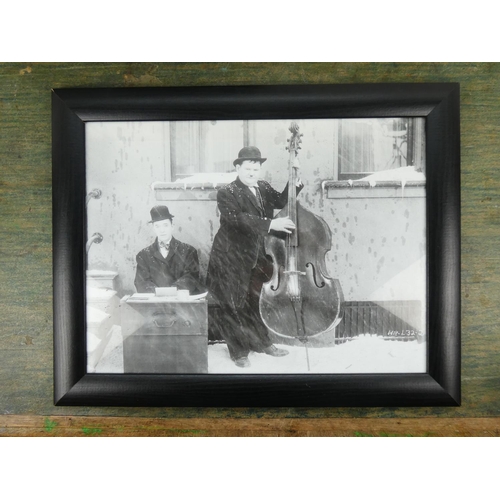 182 - A pair of framed Laurel & Hardy pictures.