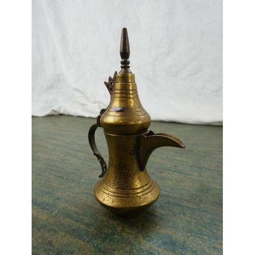 193 - An antique brass teapot and more.